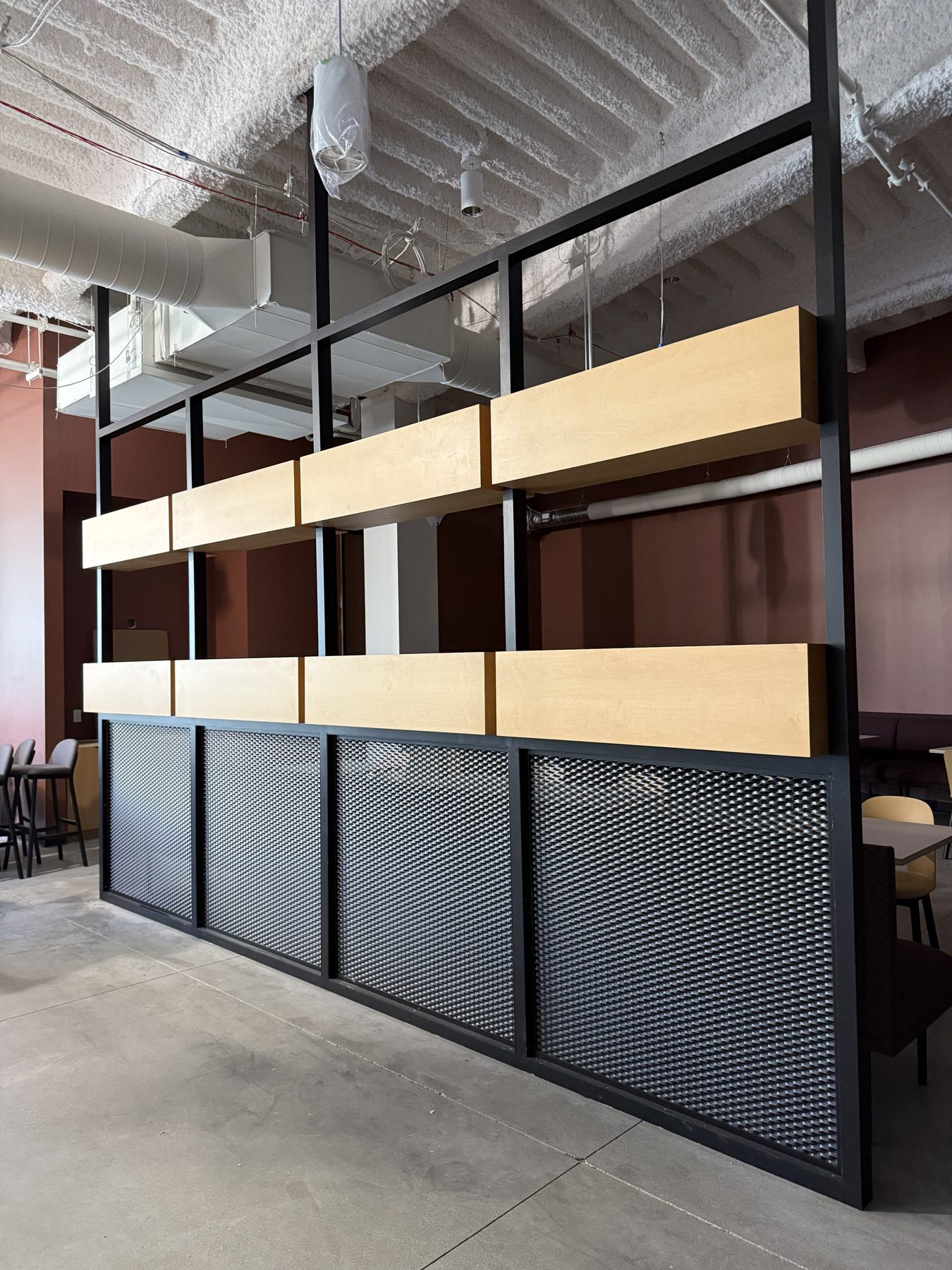 Black steel frame with mesh panels and wood planter boxes