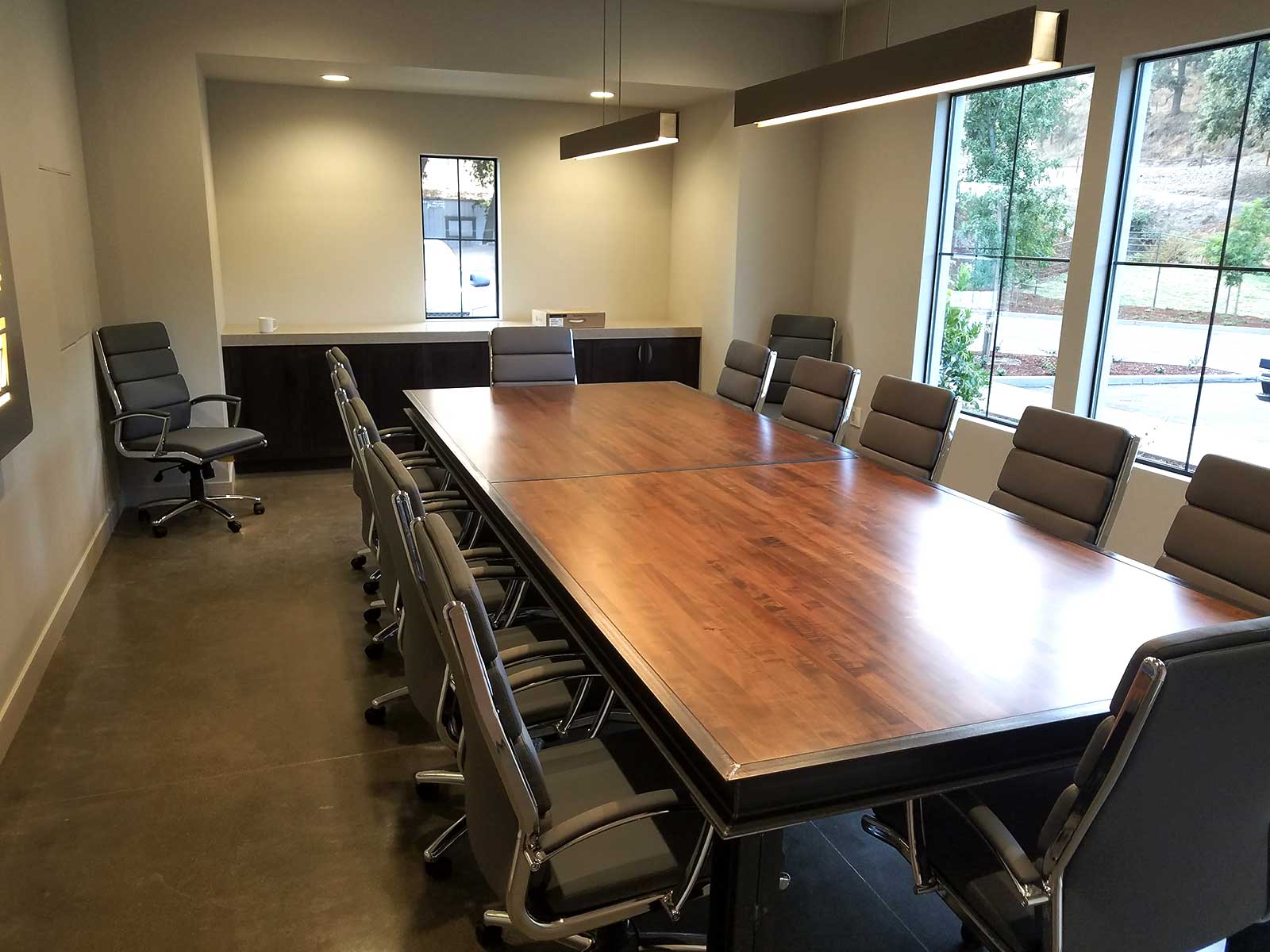 Conference table with a metal edge and metal base
